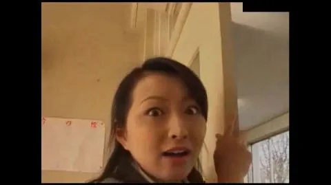 Asian Girl on Motorcycle with Male Partners