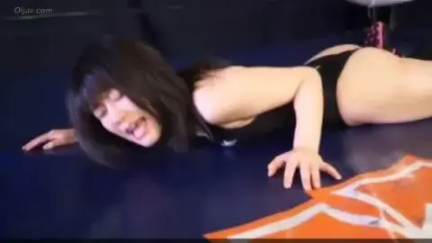 Asian Lesbians Wrestling in Ring