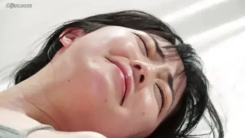 Asian Couple Intimate Moments on Bed