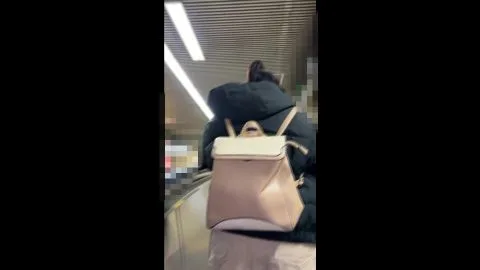 Girls in Checkered Skirts at Subway Station