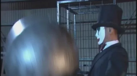 Asian in Red Costume Featured in Fetish Scenes