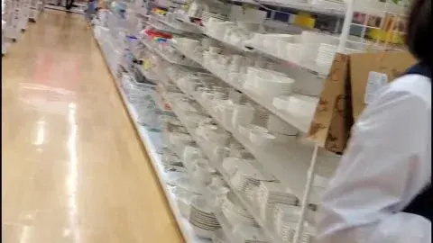 Asian Store Clerk in Uniform