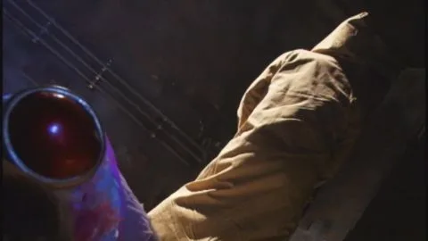 Asian Girl in Industrial Setting with Red Helmet