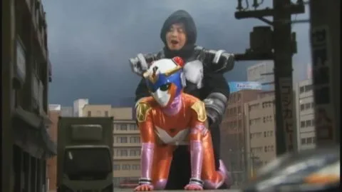 Asian Men in Robot Costumes on City Street