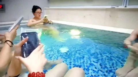 Asian Girls Relaxing in Pool and Locker Room