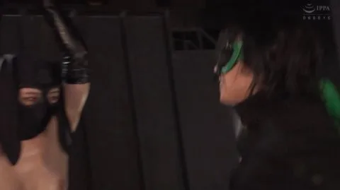 Asian Performers in Fetish Gear Engage in Intimate Acts