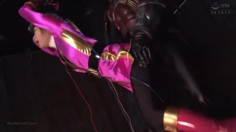 Asian Couple in Pink and Gold Costume BDSM Scene