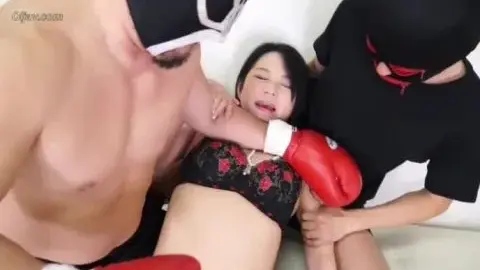 Asian Woman in Lingerie and Boxing Gloves in Bedroom Scenes