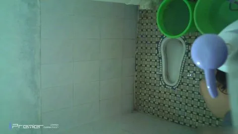 Asian Man in Bathroom Shower