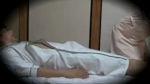 Asian Couple Intimate Moments in Bedroom