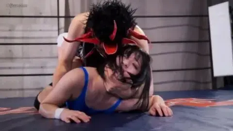 Asian Couple Engaged in Wrestling Match