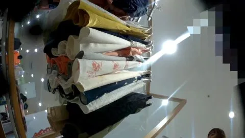 Asian Couple Try-On in Clothing Store