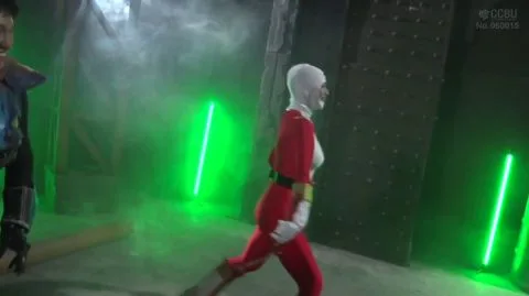 Asian Performers in Costumes on Stage