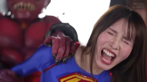 Asian Girl in Superman Costume Bondage and BDSM