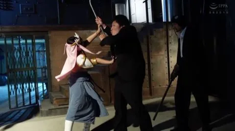 Asian Performers in Pink Costumes Engage in Dramatic Scenes