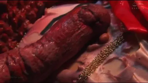 Asian Woman Masturbates in Dimly Lit Bedroom