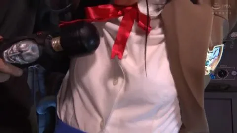 Asian Couple in BDSM Scene with Whipping and Restraint