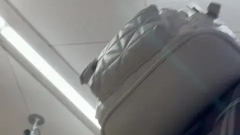 Asian Teen in Plaid Skirt Tease in Store