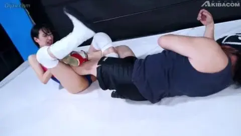 Asian Women Wrestling in Ring