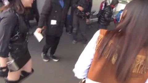 Asian Women in Leather Outfits and Masks