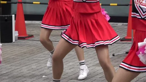 Asian Cheerleaders Dance on Street