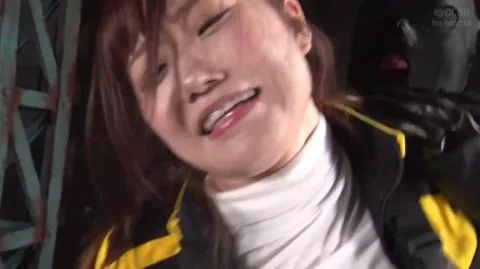 Asian Girl in Black and Yellow Jacket Bondage Scene