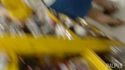 Asian Couple Kissing in Store