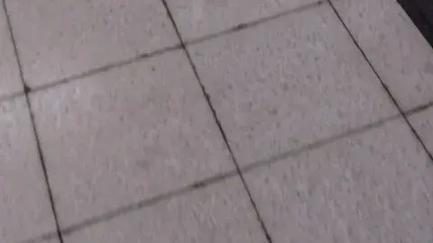 Asian Teen in Uniform on Subway Station