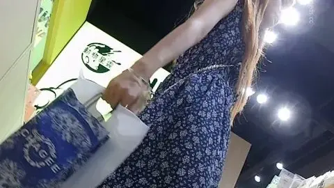 Blonde Asian in Blue Dress Shopping