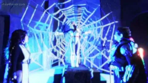 Asian Women in Fishnet Bodysuits with Robotic Partner on Stage