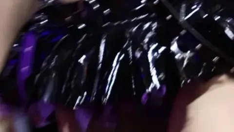 Asian Performer in Costume Stages Erotic Dance