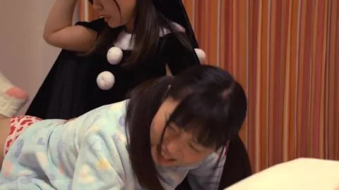 Asian Lesbians Intimate Encounter in Bedroom