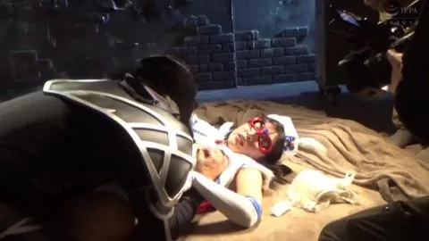 Asian Cosplay Duo in Dramatic Indoor Setting