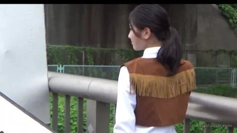 Asian Girl in Fringe Vest and Glasses