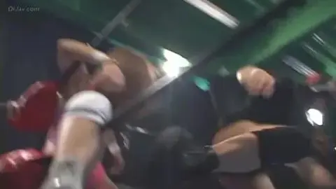 Asian Lesbians Wrestling in Ring