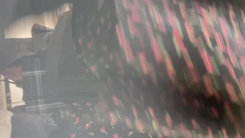 Asian teen in plaid skirt explores closet