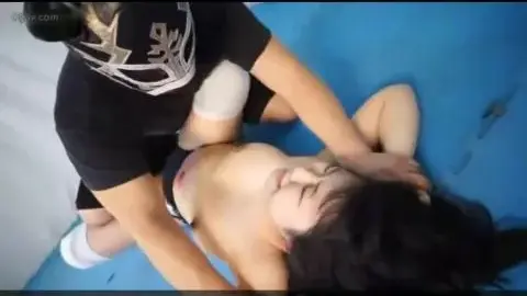 Asian Couple Engages in Wrestling and Boxing