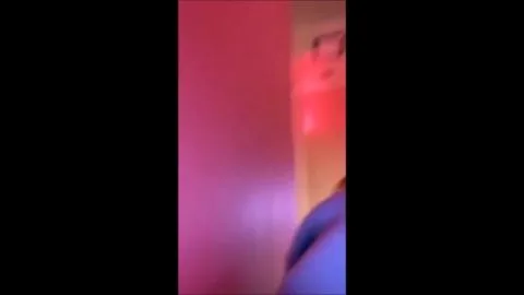 Blonde in Cat Ears Sings in Red Room