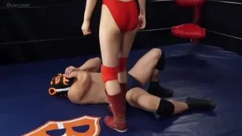 Woman in Red Bikini Wrestles Masked Man