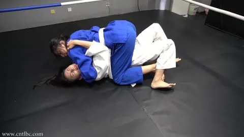 Asian Lesbians Grappling in Judogi