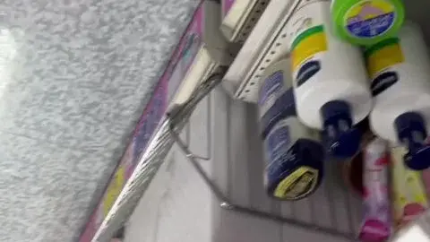 Asian Teen in Black Skirt and Orange Shoes