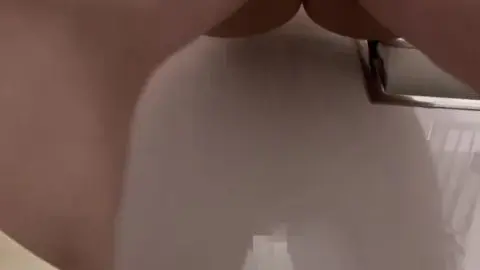 Brunette Masturbating in Bathtub