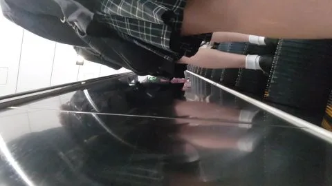 Schoolgirl in Plaid Skirt and Black Underwear