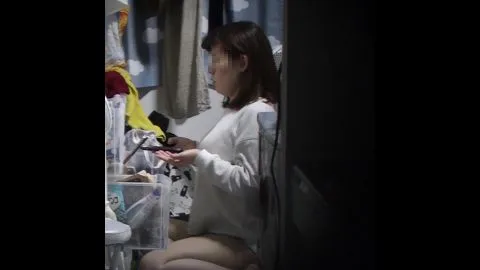 Asian Girl Naked in Cluttered Room