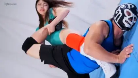 Asian Brunettes Engage in Wrestling