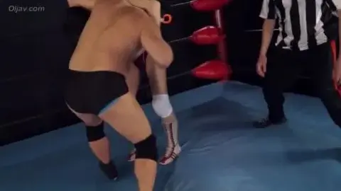 Wrestling Match with Asian Female and Caucasian Male