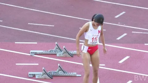 Women Running on Track