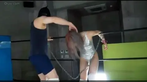 Asian Couple’s Bondage Struggle in Industrial Setting