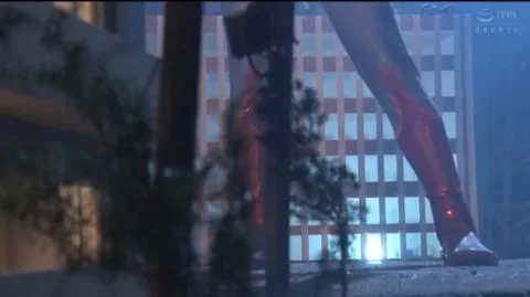 Asian Cosplayer in Action Packs