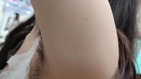 Asian Woman in White Lace Top Shows Armpit Hair